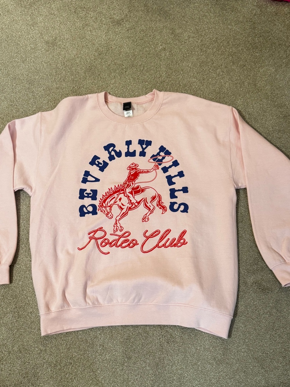 Sweet Claire Pink Crewneck Sweatshirt with Navy and Red Rodeo Graphic